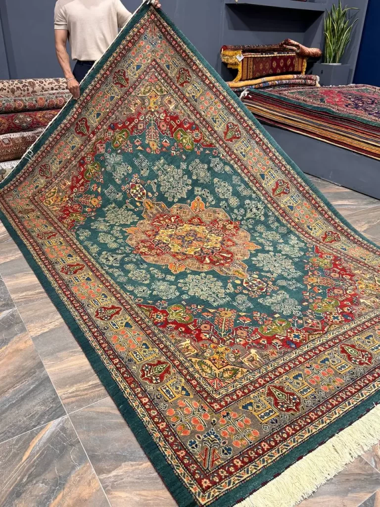 فرش دستباف قشقایی 6 متری سبز – طرح همیشه‌بهار